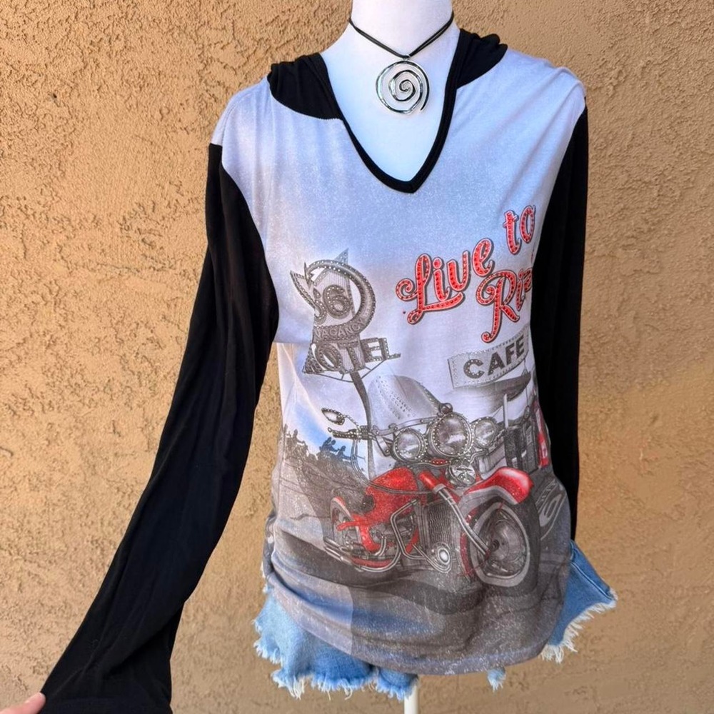 Y2K grunge biker style long sleeve top with graphic print.